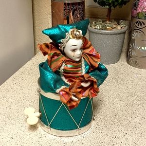 Vintage jester dancing musical clown